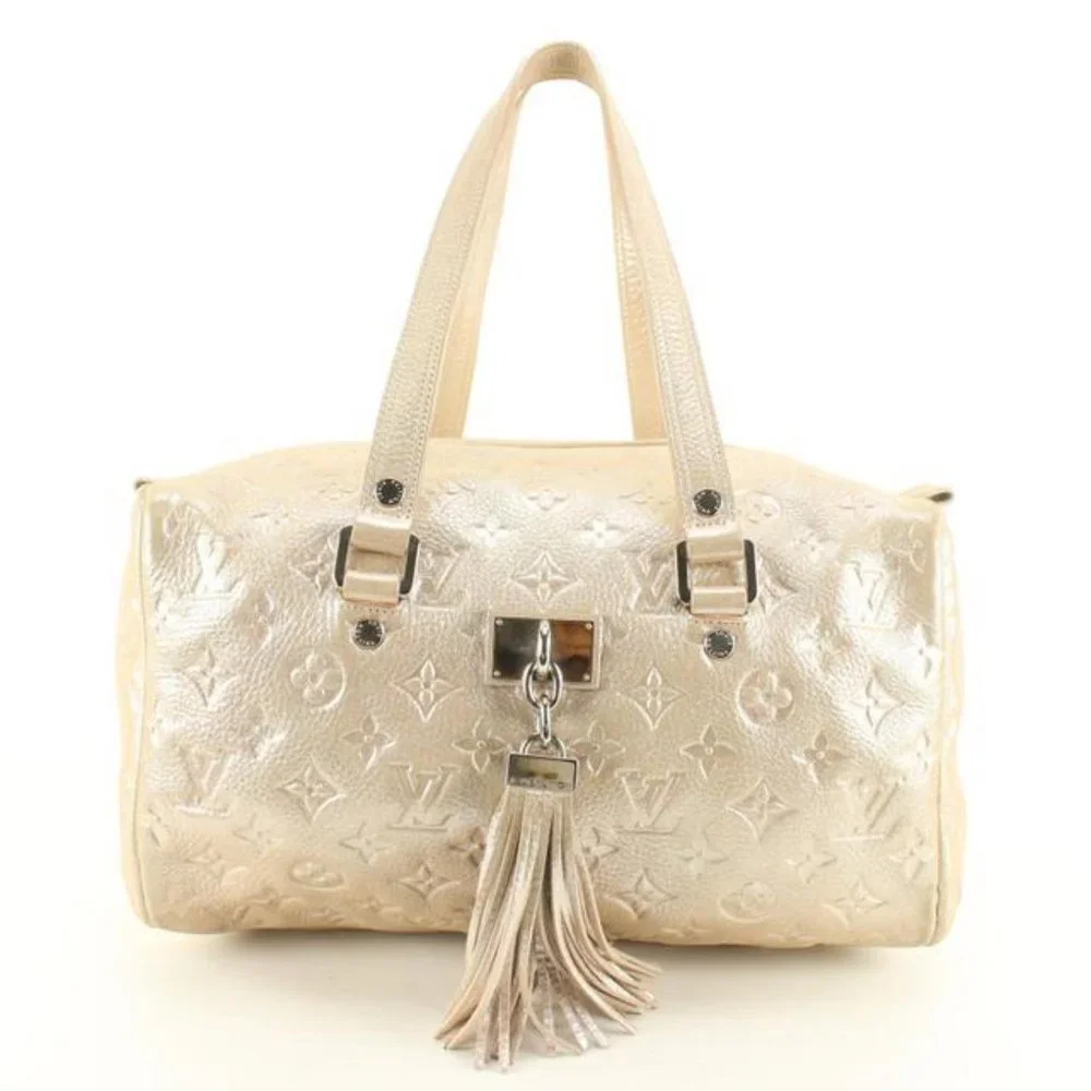 Louis Vuitton Metallic Champagne Leather Monogram Comet Boston Bag 39lu76s